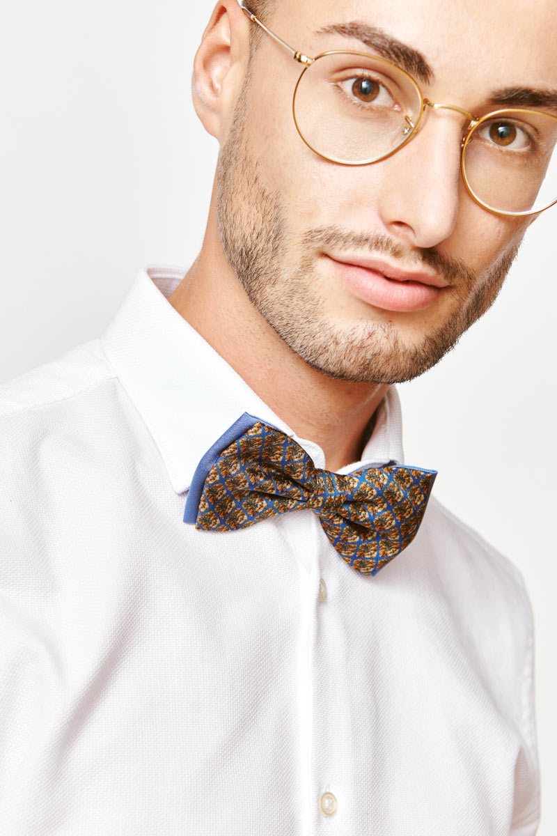 man with a brown bow tie