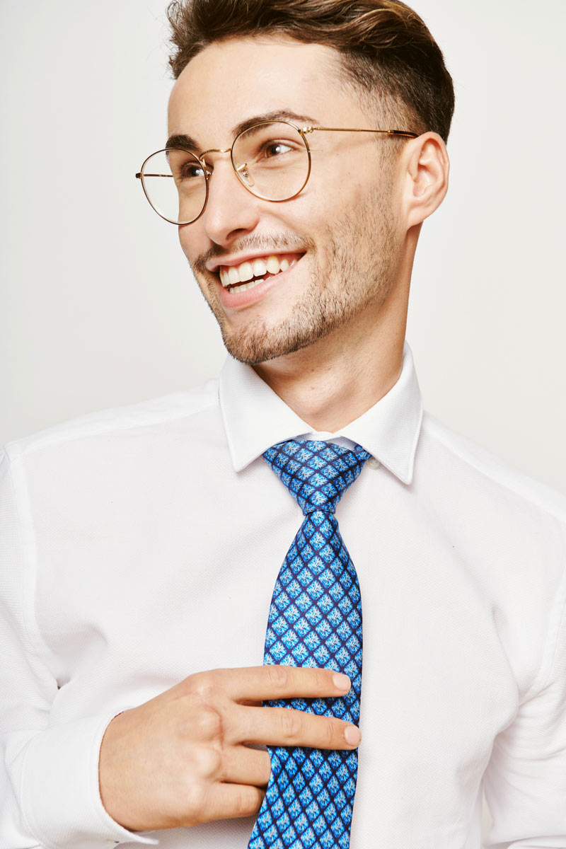 laughing man with a blue tie