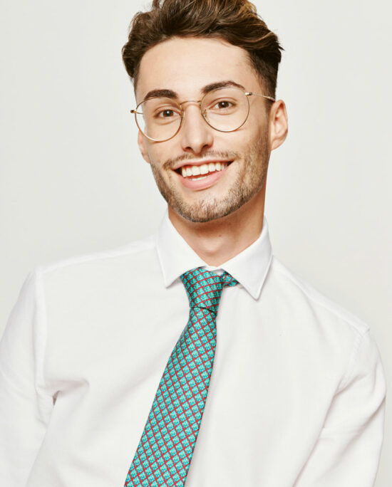 laughing man with a green tie