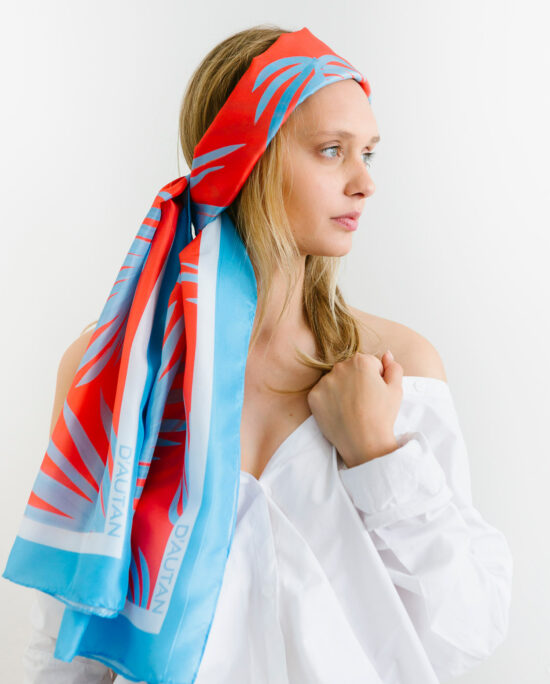 woman with a blue and red scarf on her head