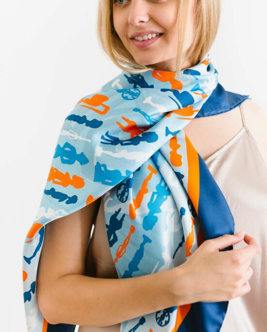 woman wearing a blue and orange scarf