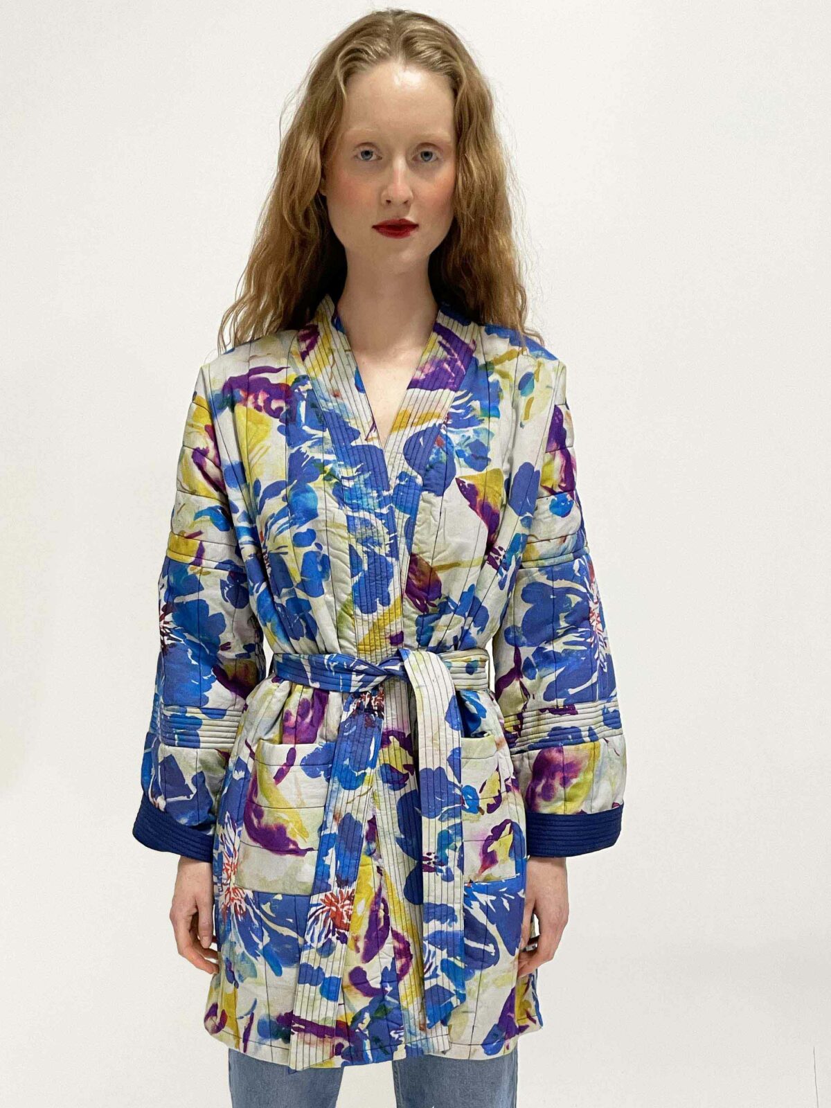 woman wearing quilted kimono lumi water flower blue